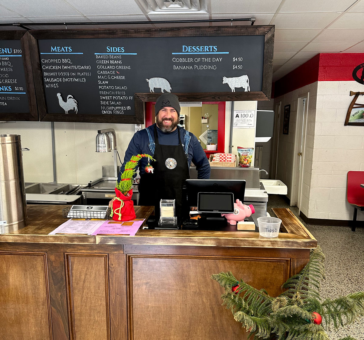 The Holy Smokes counter and chalkboard menu in Yanceyville